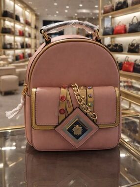 Stylish Pink Women's Backpack with Gold Trim